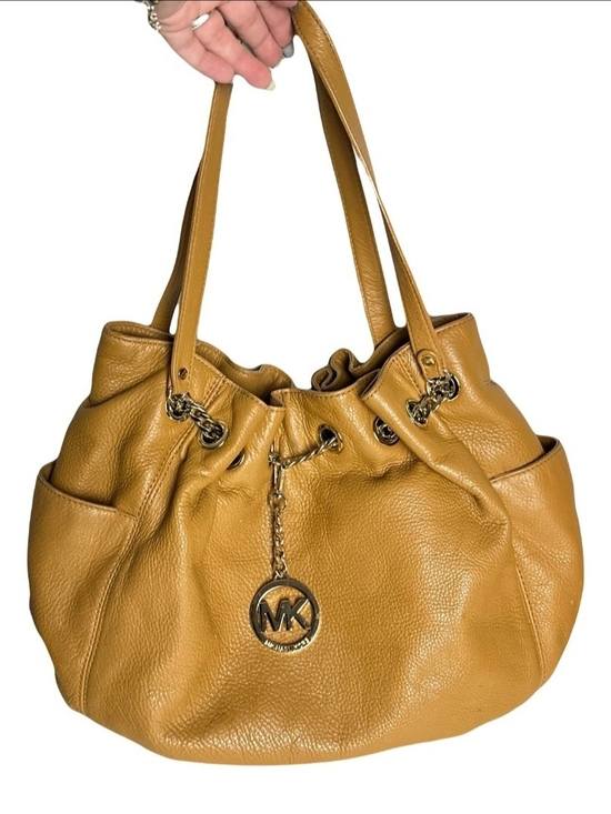 Michael Kors Handbags - Michael Kors Mustard Leather Drawstring Shoulder Bag